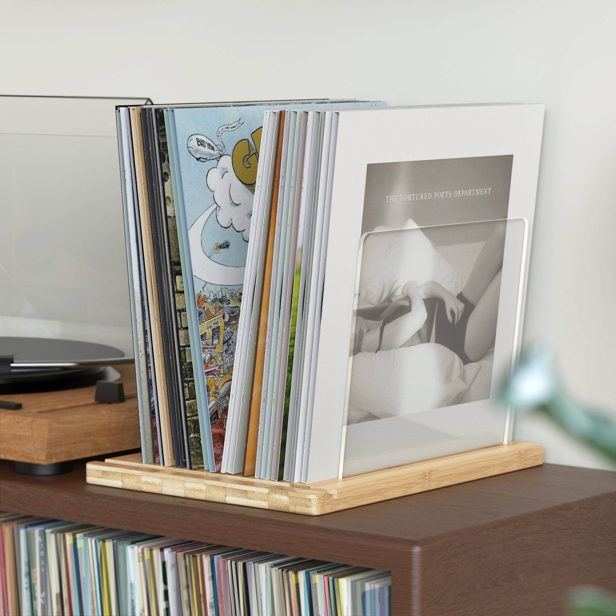 TAKMORK Record Storage Holder is made of high density transparent acrylic sheet with thick bamboo material，The vinyl records holder measures approximately 11 x 14.57 x 9.84 inches，enough to hold about 45 records without worrying about tipping.The simple yet elegant combination of natural wood and clear acrylic ensures it complements various home decoration styles. 